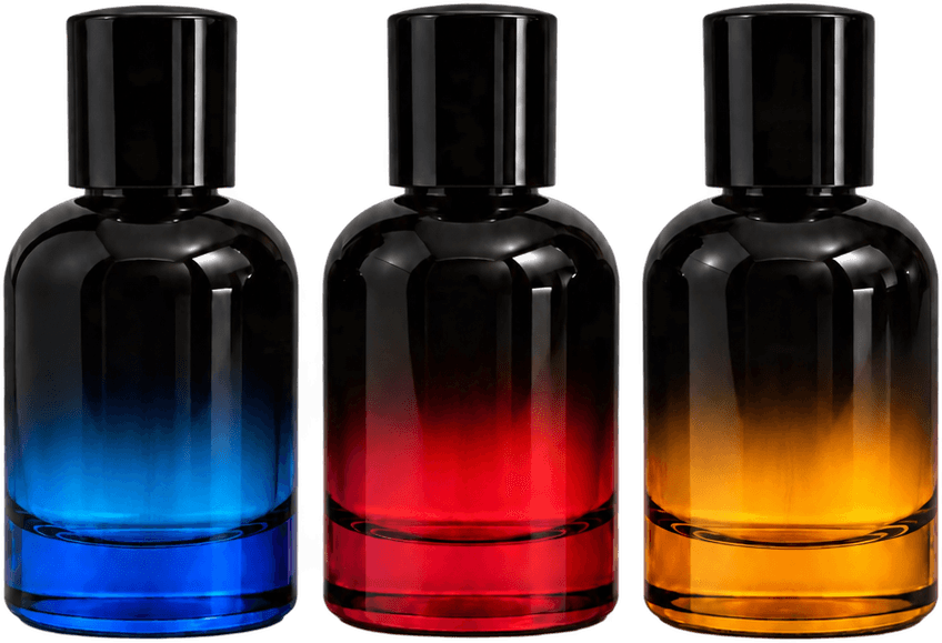 Las tres fragancias del Combo Esencial de Enigma: azul, roja y ámbar, con tapa negra.